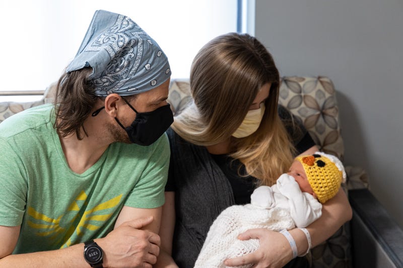 Parents and their newborn at UPMC Magee Women's Hospital