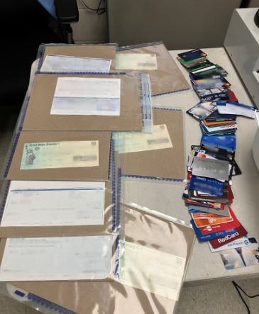 At Brown's home, investigators also discovered materials and tools necessary to create fraudulent identifications and debit/credit cards.