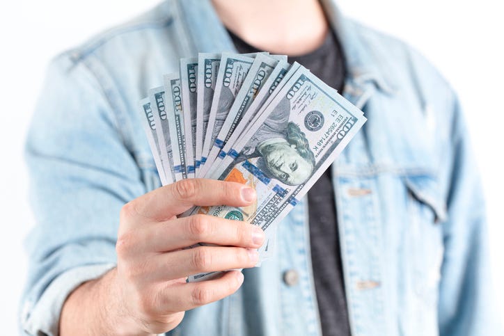 man holding money