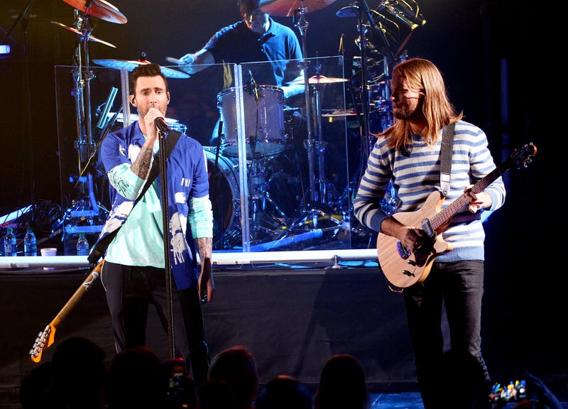 Adam Levine (L) and James Valentine of Maroon 5 perform at the iHeartRadio Album Release Party with Maroon 5 at iHeartRadio Theater on November 7, 2017 in Burbank, California.