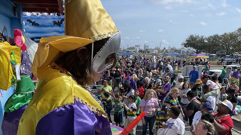 Annette's daughter in costume on a Mardi Gras float in Metairie