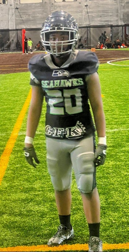 teen in football gear