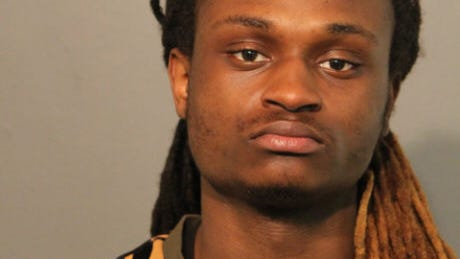 Man charged with looting downtown business in August