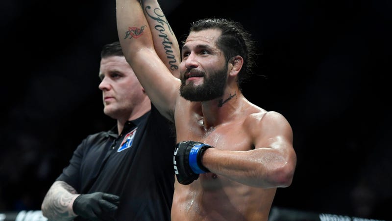 Jorge Masvidal gets his hand raised after knocking out Darren Till at UFC Fight Night 147 in London.