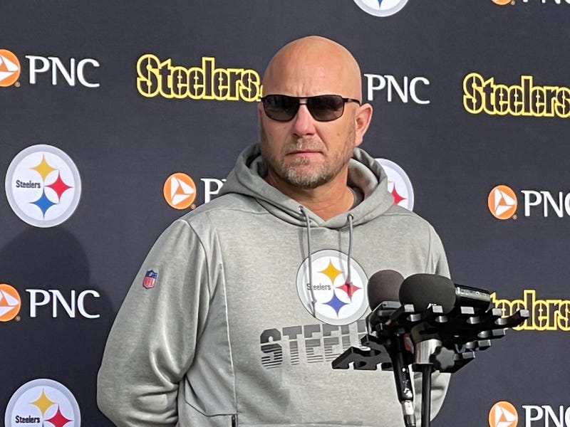 Matt Canada at podium