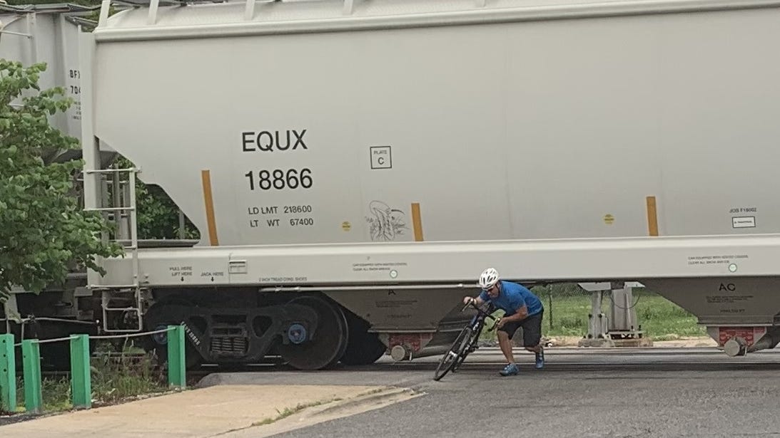 Stalled freight train blocks traffic for nearly an hour