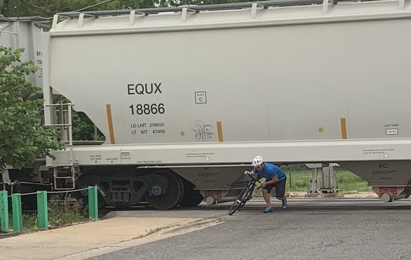 Stalled freight train blocks traffic for nearly an hour