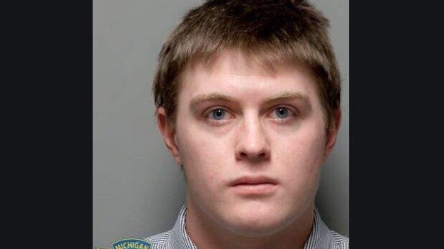 Wolverine Watchmen member charged after modified automatic weapon found at home