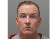 Television broadcaster Dan McLaughlin in a booking photo taken after his arrest December 4, 2022.