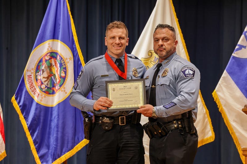 Sgt. Jeremy Depies and Minneapolis Police Chief Brian O'Hara.
