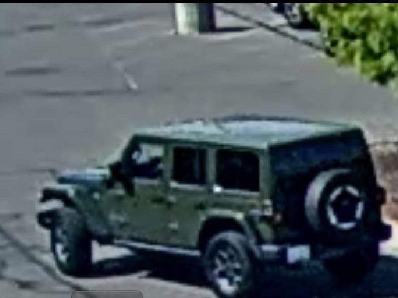 Suspect's green Jeep Wrangler