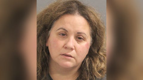 Crutch-swinging LI mom attacks, spits at officers after son's traffic stop: police