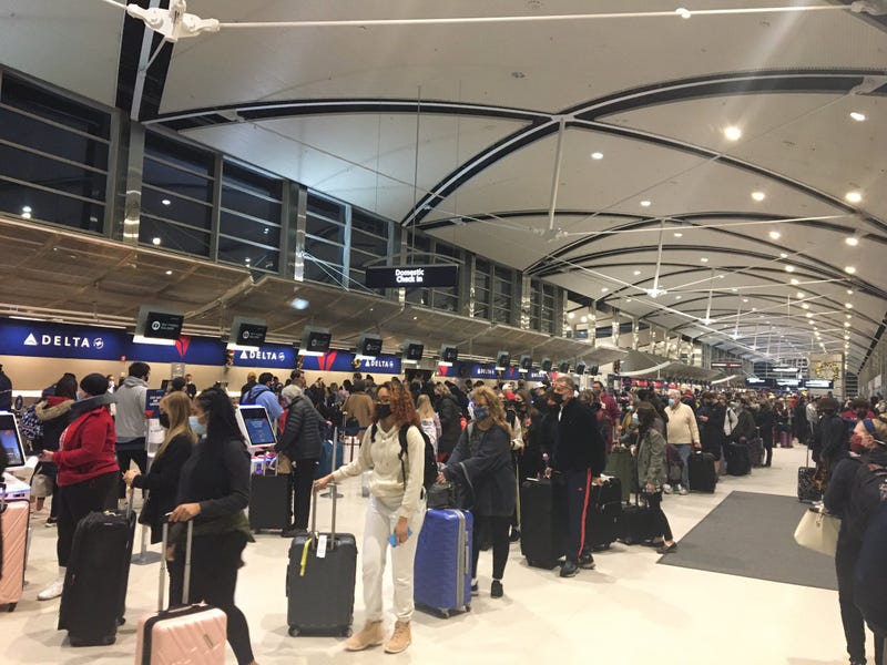 Travelers at Detroit Metro Airport