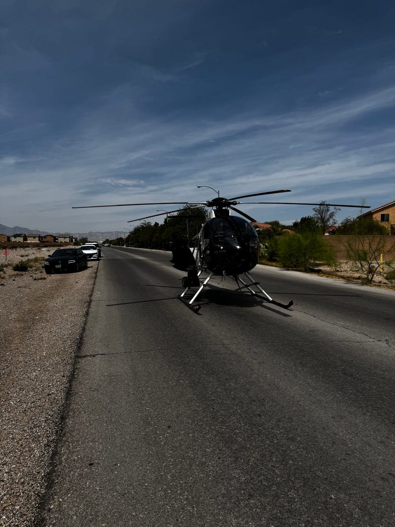 A Las Vegas Metro Police helicopter makes a precautionary landing in a southwest Las Vegas neighborhood.