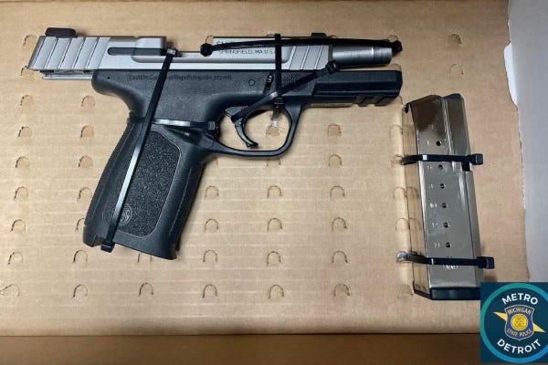 Handgun and clip seized during a traffic stop in Warren