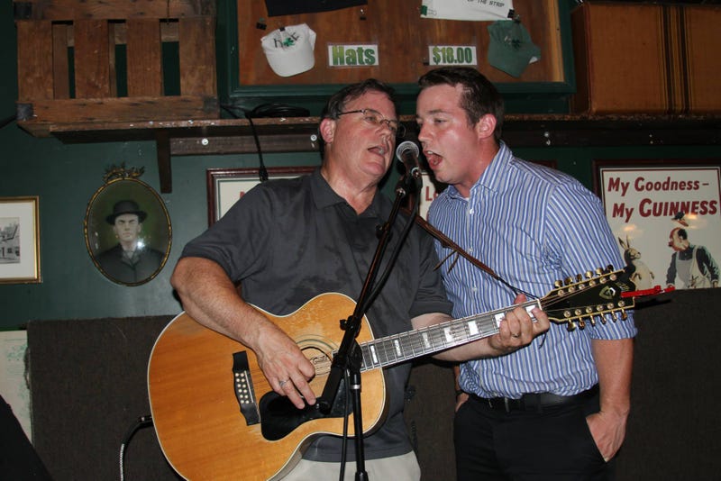 Mike Gallagher performing with his son John Morgan