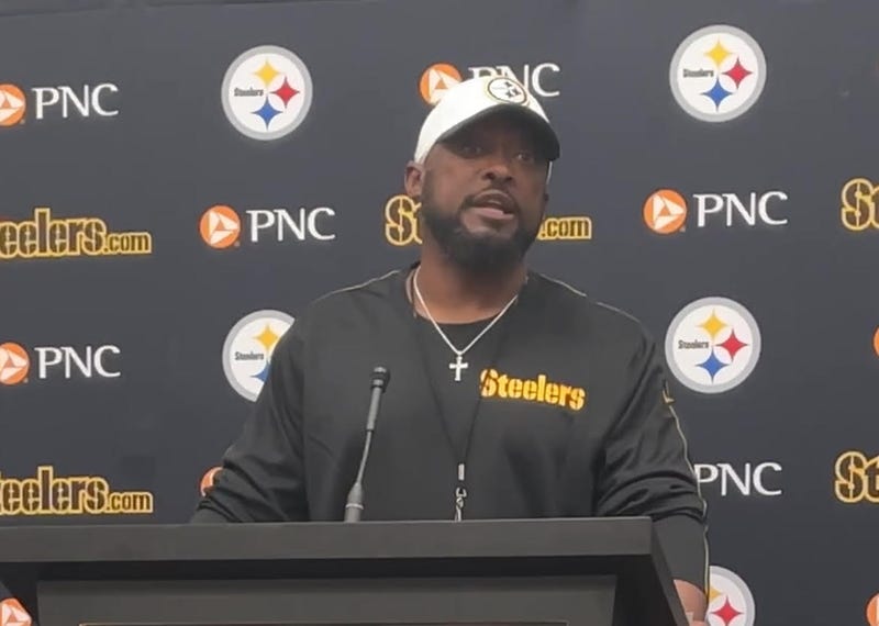 Mike Tomlin at a podium