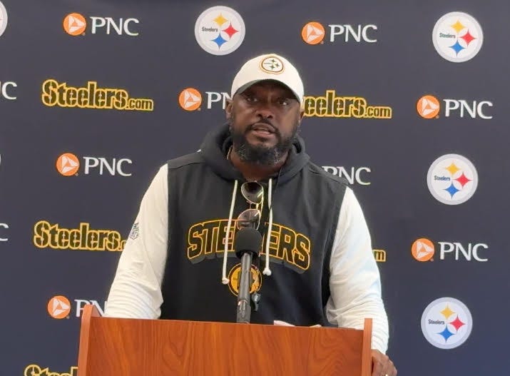 Mike Tomlin at a podium