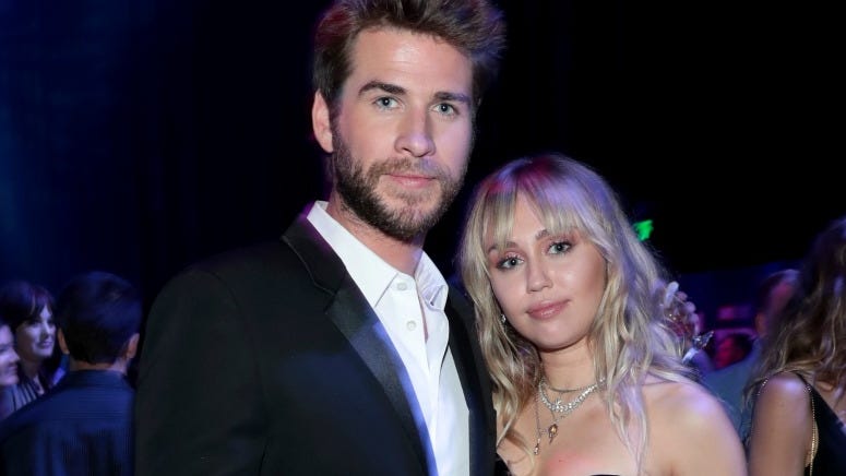 Miley Cyrus Grabbed by a Fan While With Liam Hemsworth