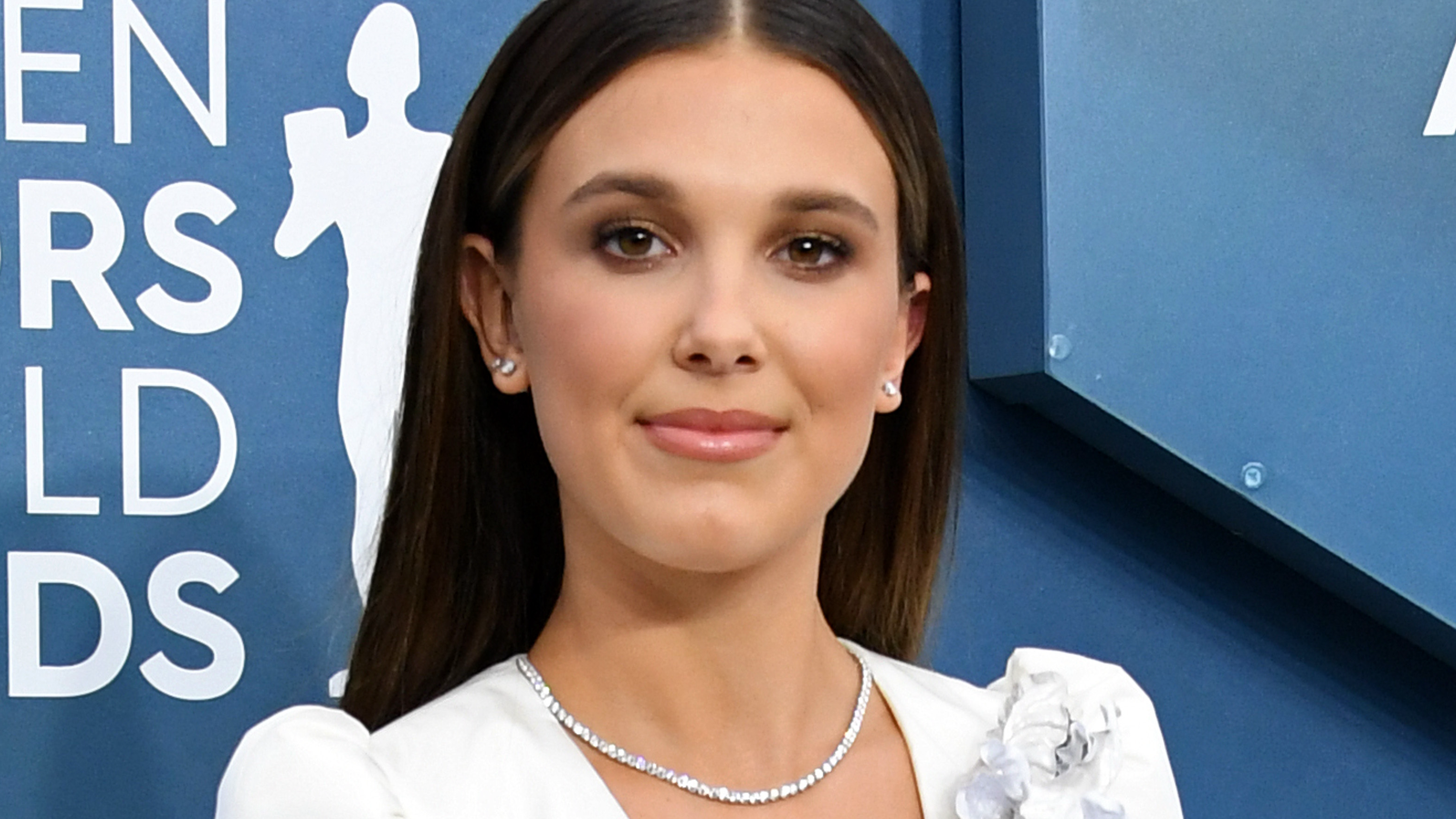’Stranger Things’ star Millie Bobby Brown celebrates 18th birthday in blonde wig and corset