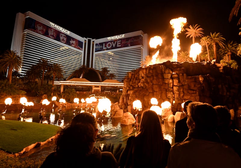 Tourist watch a show outside the Mirage Hotel