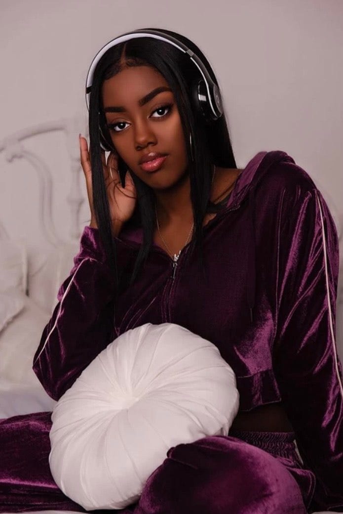 Miyah Williams wearing headphones