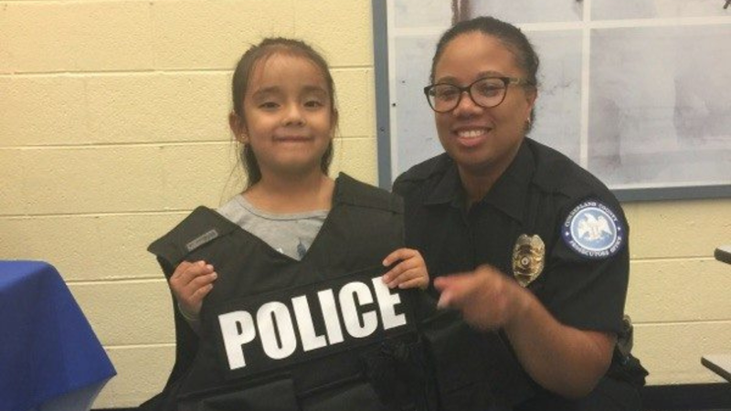 Detective Sgt. Monica Mosley and a child