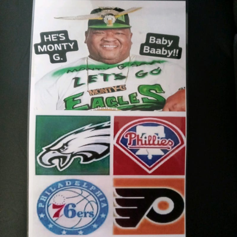 Monty G's favorite Philadelphia sports teams, plus his trademark Eagles hat.