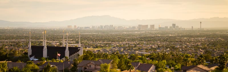 A Mormon temple in the foreground of the Las Vegas Strip