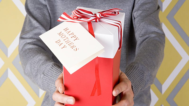 mother's day gift being handed to someone