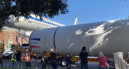 Two solid rocket motors arrived at the California Science Center Wednesday morning, drawing a large crowd. 