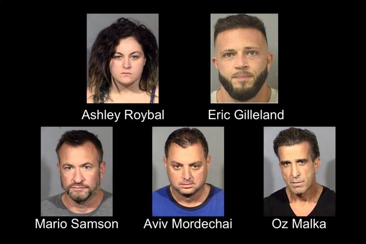 Booking photos of suspects involved in a Las Vegas moving scam