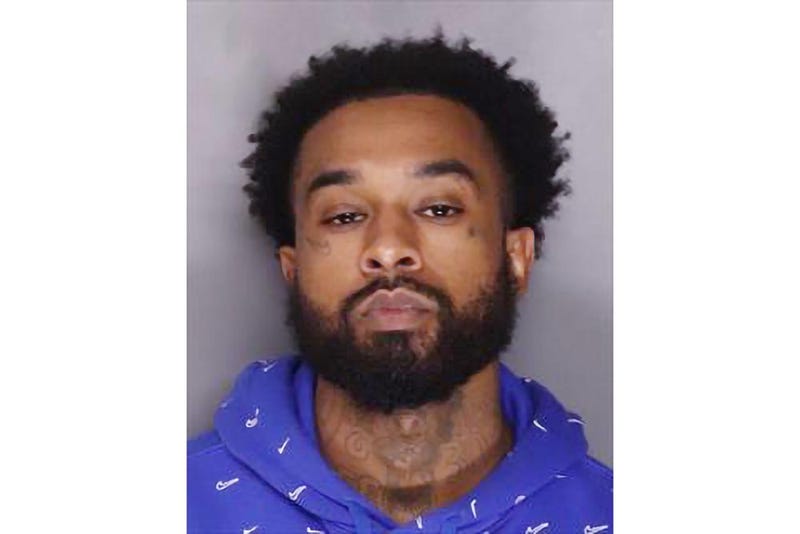 Booking photo of murder suspect Mtula Payton