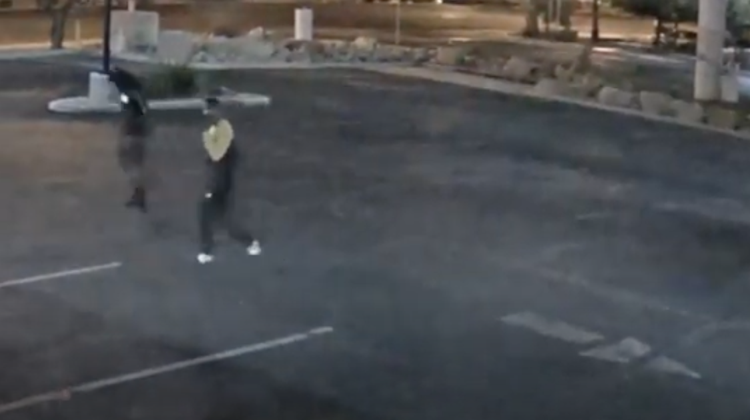 Surveillance snapshot of men sought for a fatal shooting