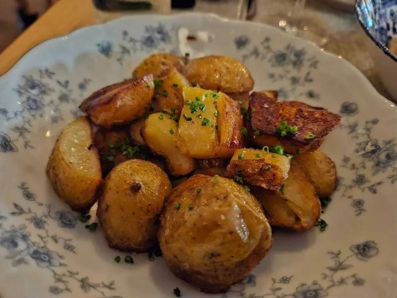 These might be James Beard winning potatoes? They're given a bath in duck fat for that crispy crunch and melt in your mouth middle at St. Paul's Myriel.  