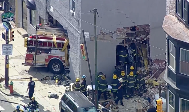 A Philadelphia fire truck went into a four-story building on 7th and Girard in North Philly on May 27, 2021.