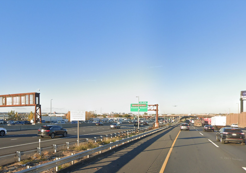 The bus struck the truck on the New Jersey Turnpike in Elizbeth on Tuesday morning, officials said