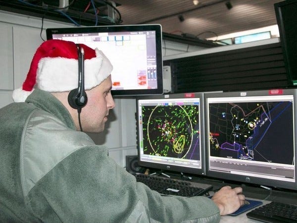 New York Air National Guard Tech. Sgt. Brady King of the 224th Air Defense Squadron studiously prepares for Santa tracking operations during recent training at the Eastern Air Defense Sector in Rome. A headquarters unit of the North American Aerospace Defense Command (NORAD), EADS supports the NORAD Tracks Santa operation every year.