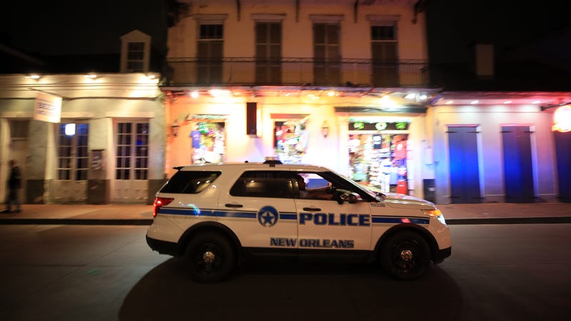 Members of the New Orelans Police Department help clear Bourbon Street on March 16, 2020 in New Orleans, Louisiana.