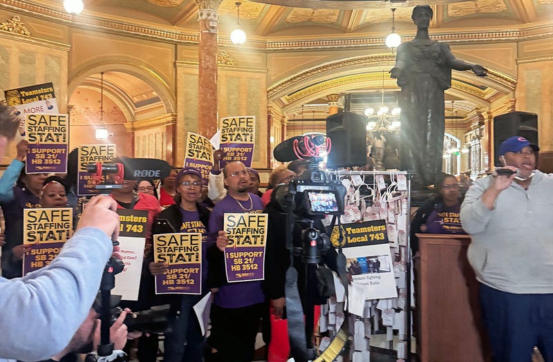Members of Teamsters Local 743 rallied inside the Illinois State Capitol, calling for increased staffing in health care facilities and urging lawmakers to support bills aimed at improving patient care through safer staffing levels