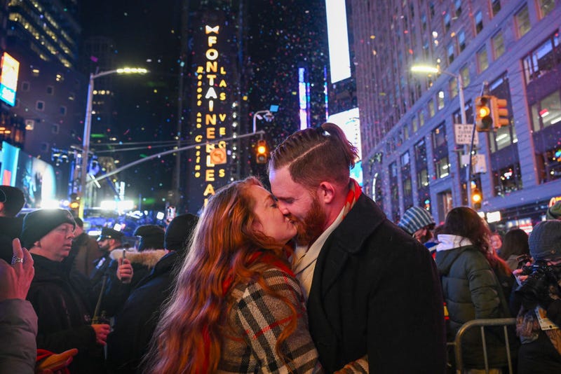 Matt Lutz and Olivia Shain, from Owensville, Indiana, get engaged at midnight on New Year’s Eve in Times Square on Jan. 1, 2024.