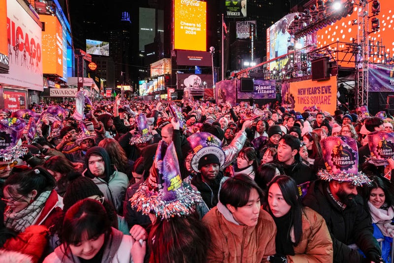 Revelers wait for the annual New Year's Eve celebration in Times Square on Dec. 31, 2023.