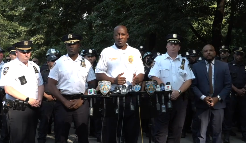 Deputy Commissioner Tarik Sheppard (Center), Chief of Patrol John Chell (Middle Right) and other NYPD officials hold a press conference about the deployment of additional patrols in Central Park amid robberies.