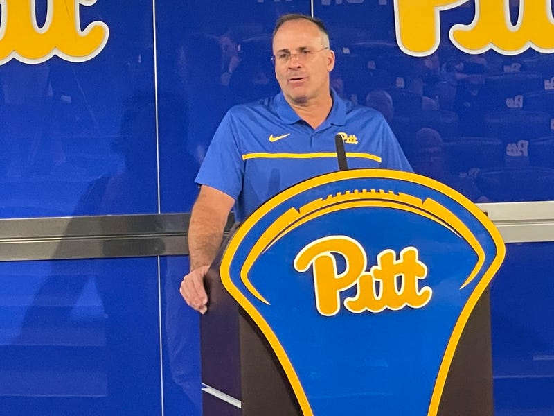 Pat Narduzzi at a podium