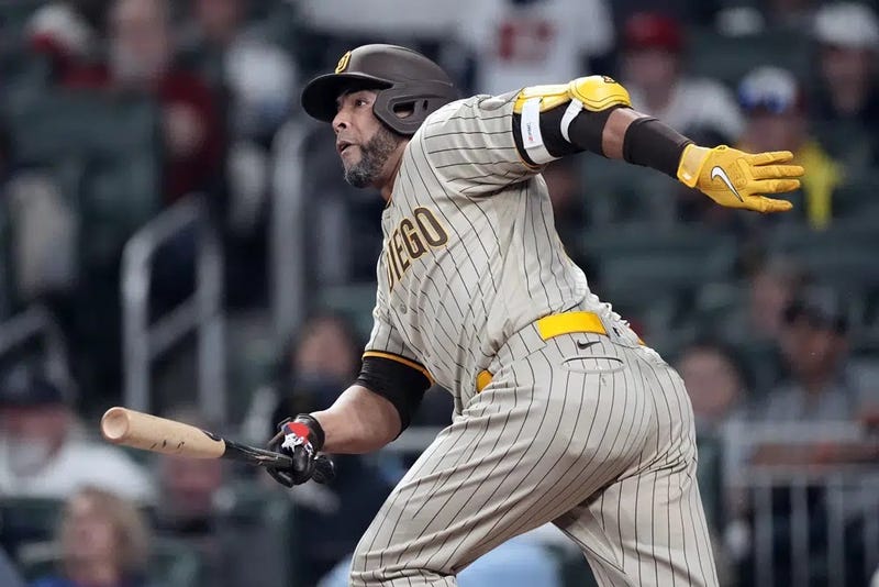 San Diego Padres designated hitter Nelson Cruz runs to first base after hitting two-run single in the sixth inning of a their game against the Atlanta Braves, Sunday, April 9, 2023, in Atlanta.