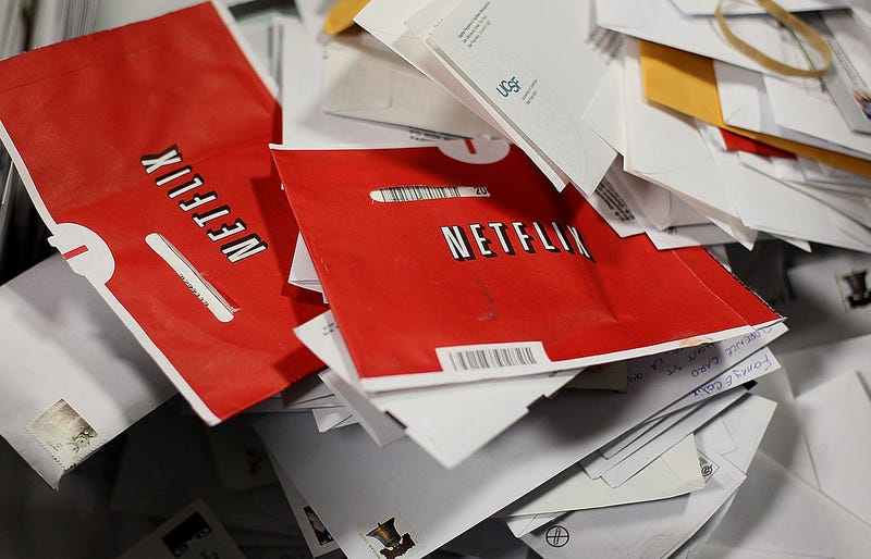 pile of mail with Netflix DVD delivery