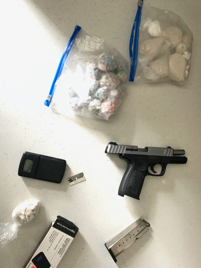 Drugs and weapon seized in raid