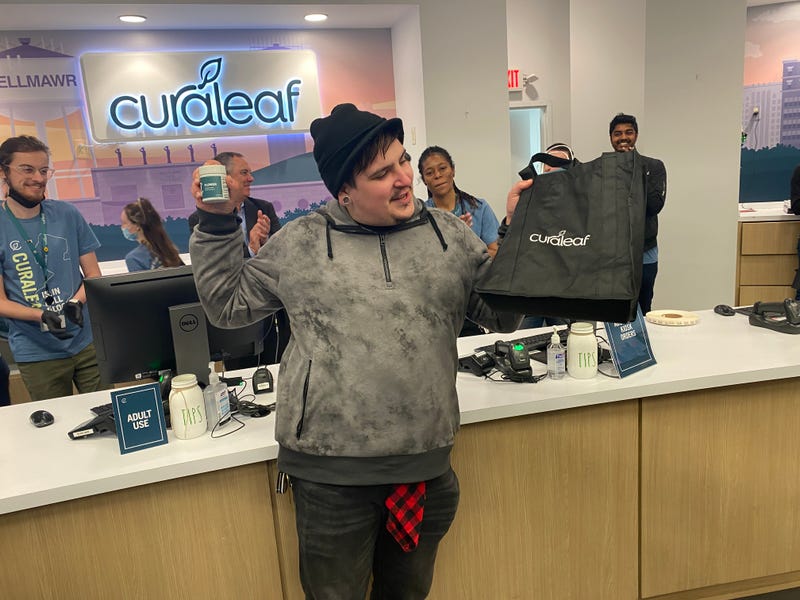 Customer is at the checkout line of a Curaleaf dispensary in New Jersey on the first day of legal recreational purchase and use in the state. April 21, 2022