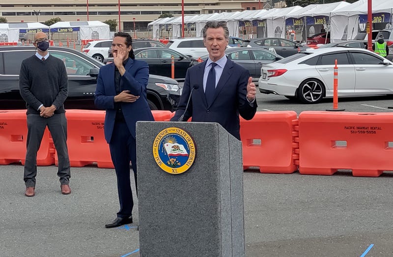 Gov. Gavin Newsom details the state's plan to eliminate the color-coded tier system by mid-June, pending specific criteria on hospitalizations and vaccine availability.