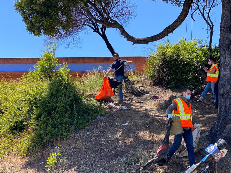 Governor Newsom picks up trash in Richmond to promote his $1.5 billion proposal to clean up California.